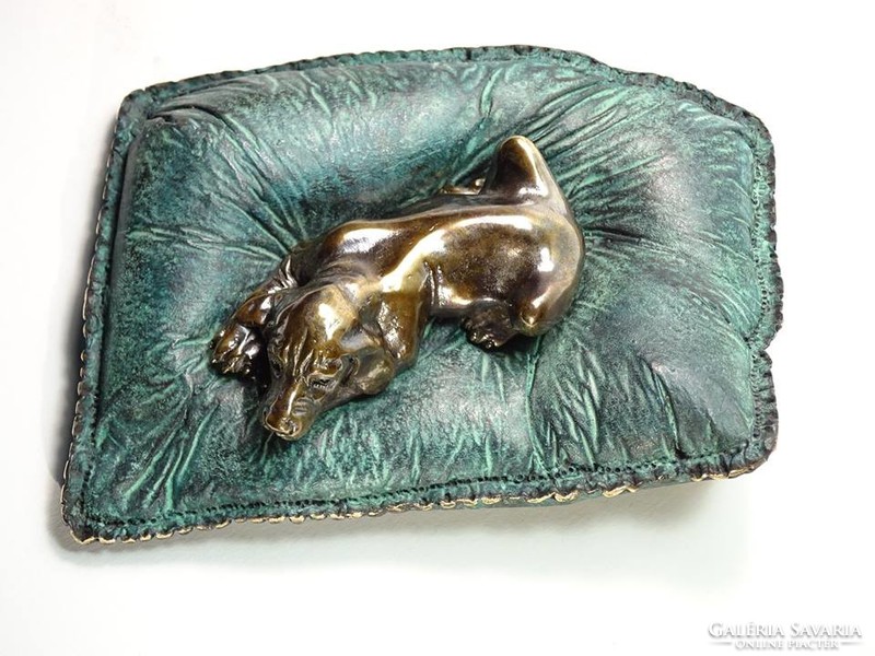 Loyalty retriever puppy on bronze pillow