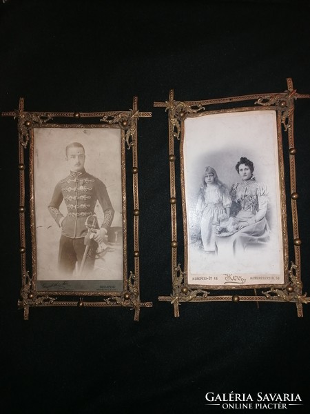 Pair of antique photo holders with photos
