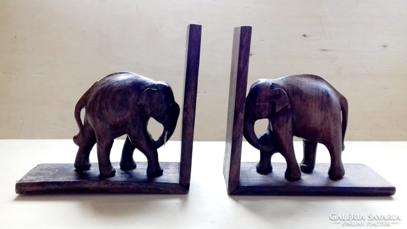Old walnut elephant book support