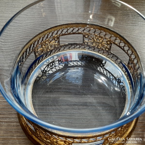 Glass serving in metal holder