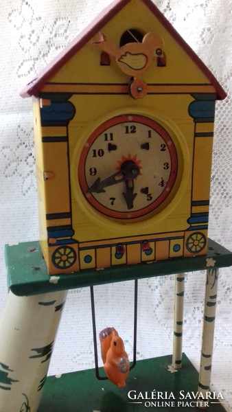 Antique tin cottage shaped toy clock