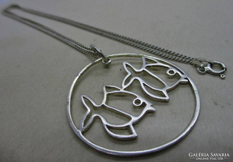 Beautiful handcrafted silver necklace with fish