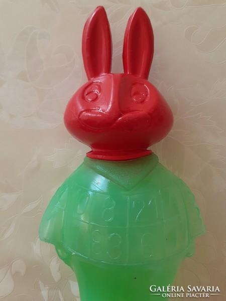 Retro rabbit in plastic candy wrap with dragee Easter bunny