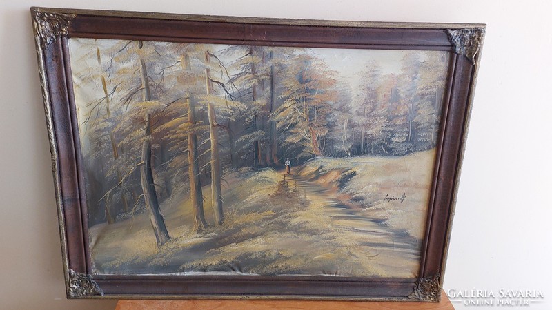 (K) landscape painting with a small female figure signed in a 76x55 cm frame