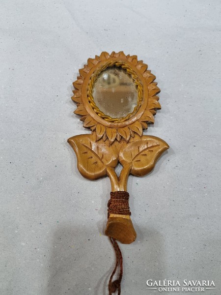 Old wood carved hand mirror