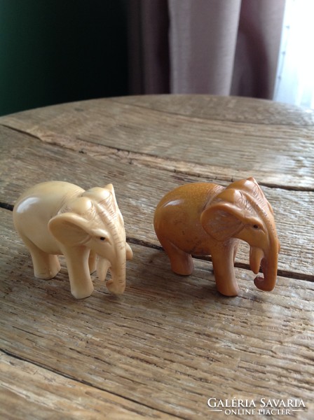 Old hand-carved vinyl record? Elephants in pairs