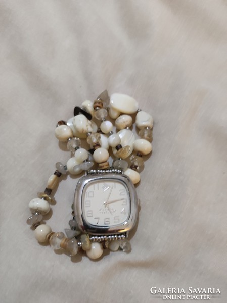 Silver watch (silpada) with a strap made of several beautiful stones