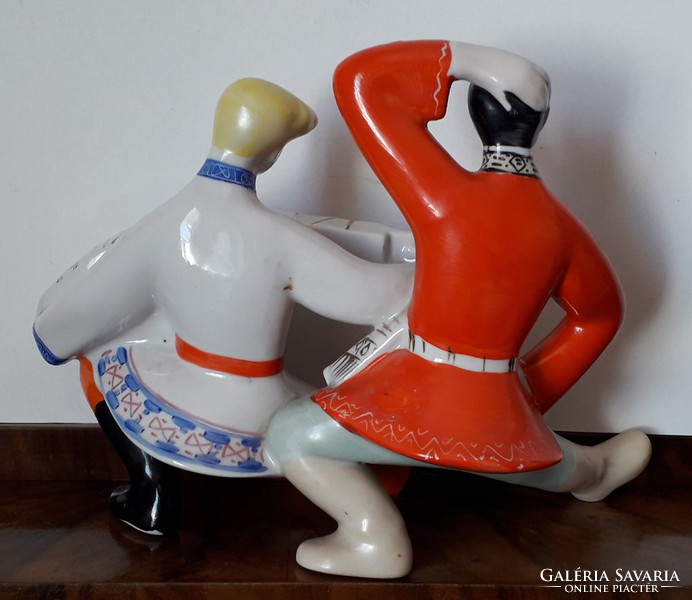 Retro Russian porcelain statue of a folk dancer in folk costume with an accordion dancer