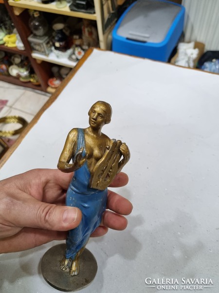 Old painted aluminum figurine