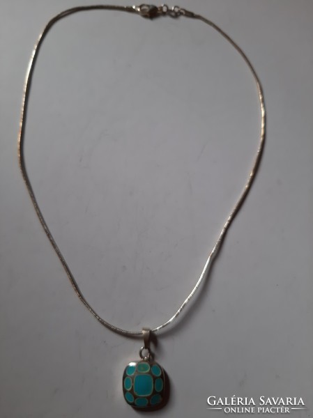Tolerant pendant in silver with silver marked chain