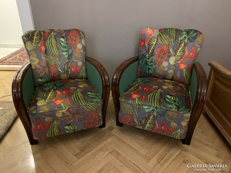 Refurbished and restored art deco armchairs with a jungle pattern