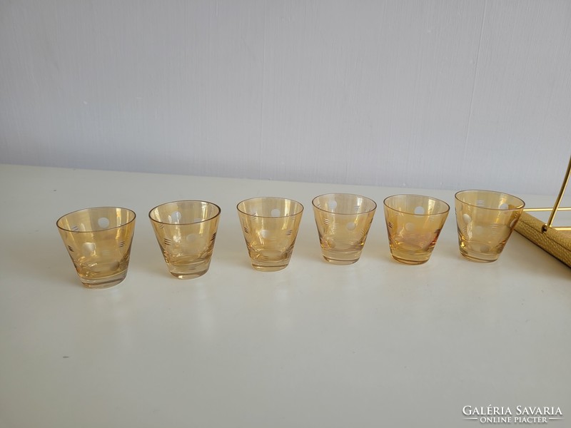 Retro old gold colored polka dot drink set with glass holder for mid century