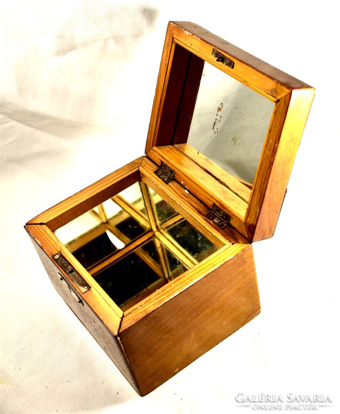 Inside antique wooden box with full mirror insert