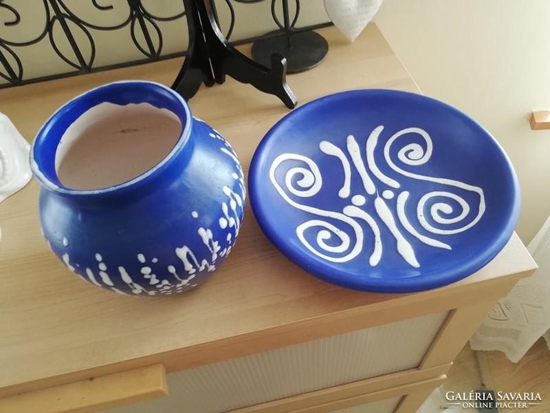 Old blue and white ceramic vase and wall plate