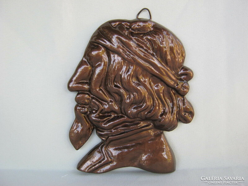 Manly head of metal wall ornament