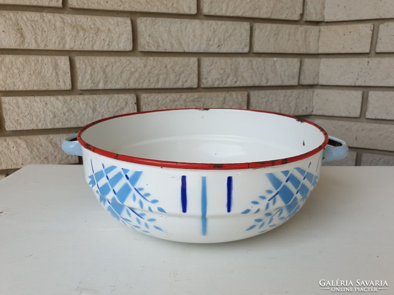 Old vintage enameled large bowl with legs