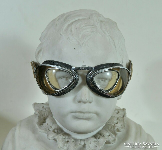 Vintage motorcycle and flying goggles, 1920s, protector, aviator