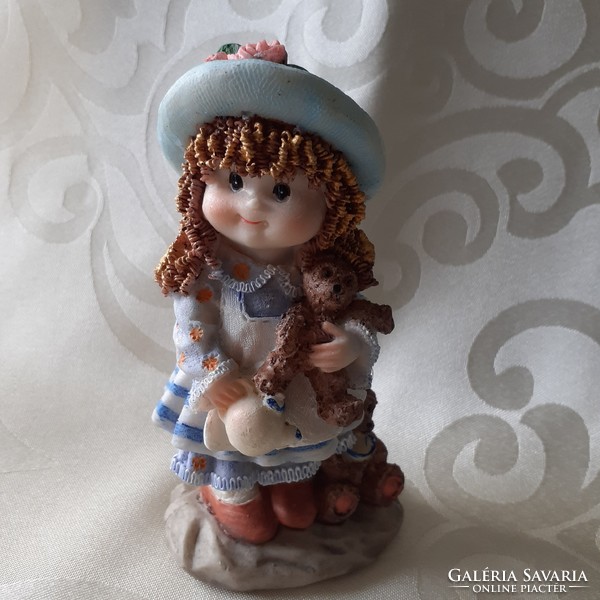 Cute hat doll figure with teddy bear