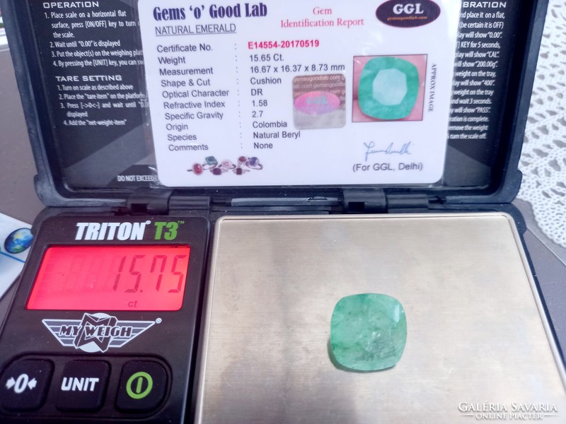 Columbian oval emerald gemstone slightly opaque, with cerification