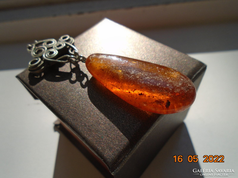 Antique amber pendant with decorative filigree alpaca pendant with hook