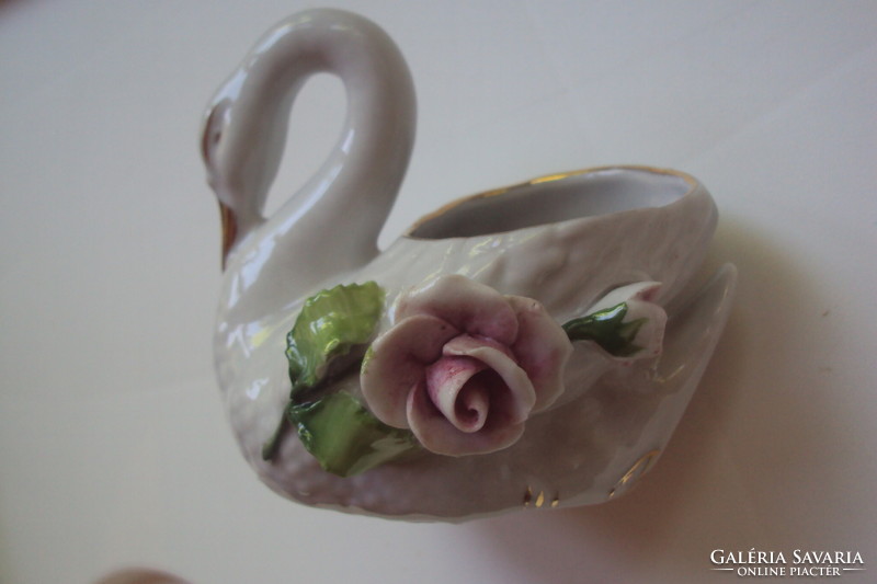 Porcelain swan with plastic rose decoration. (For ring holder)