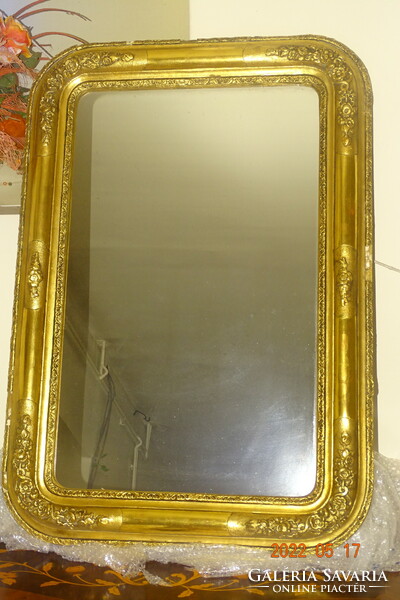 Antique Biedermeier golden mirror.