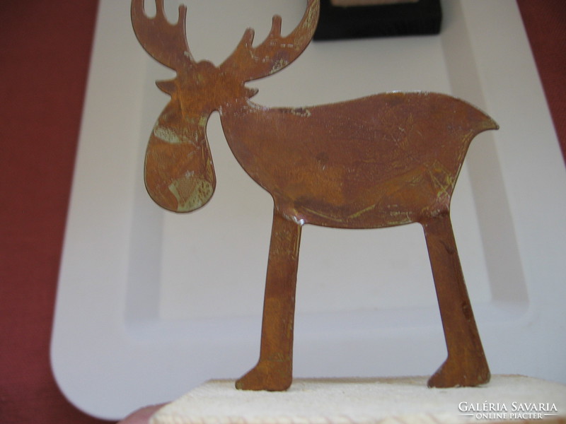 Christmas decoration with metal deer on wooden base
