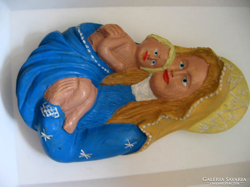 Naive painted wooden madonna with your baby