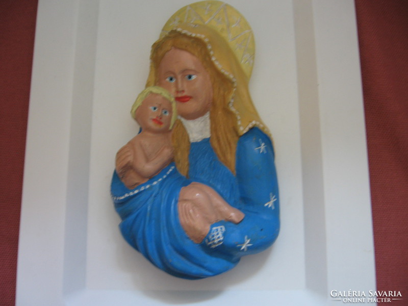 Naive painted wooden madonna with your baby