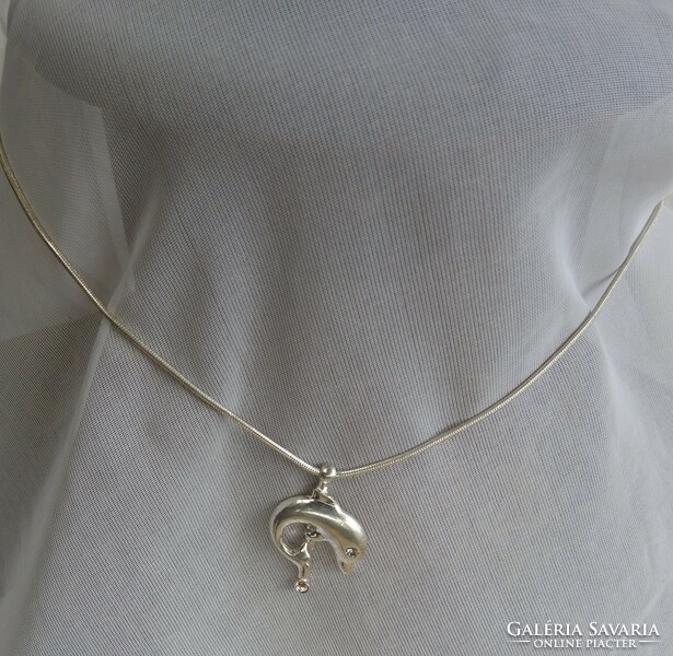Silver necklace with dolphin pendant