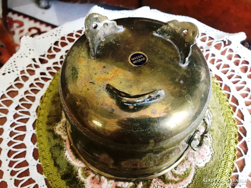 Specially shaped, medium-sized, old, three-legged, brass pot