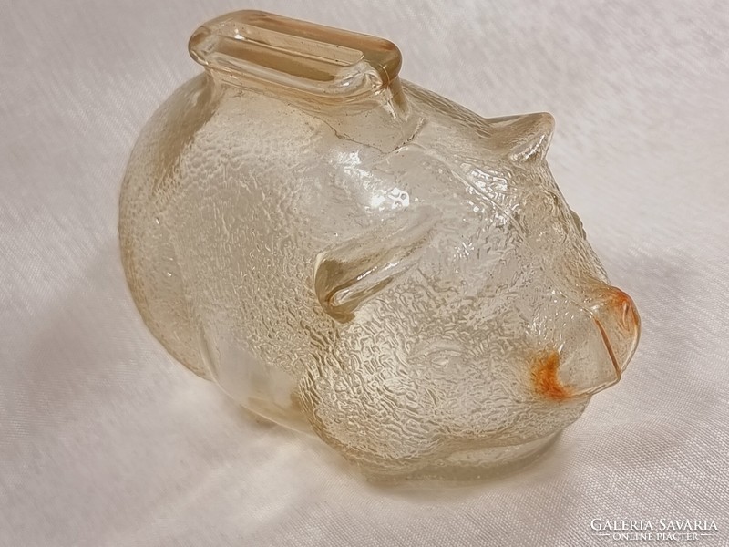 Piggy bank with iridescent glass and piggy money box from the 1950s.