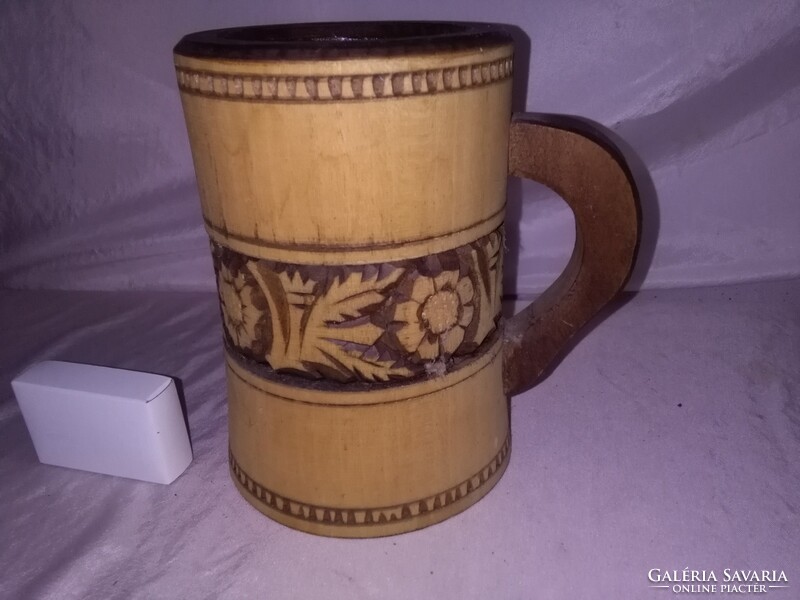 Carved wooden cup and beer mug