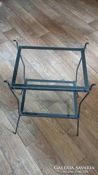 Old used metal table with glass sheets