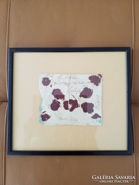Envelope with wax seal in frame, law office ornament