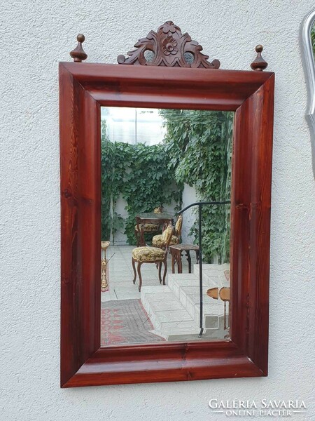 Beautiful old wall wooden mirror with polished glass