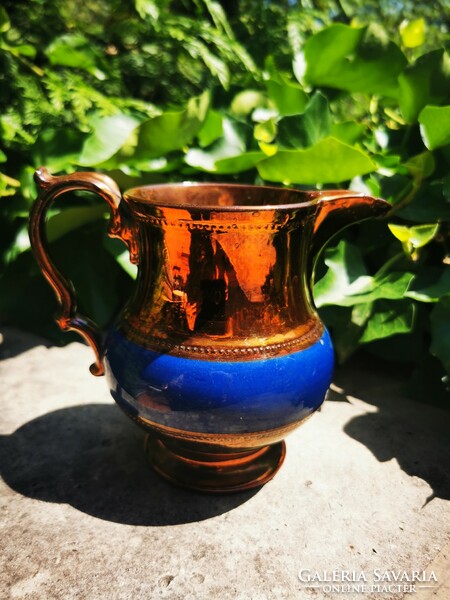 Antique faunhead jug