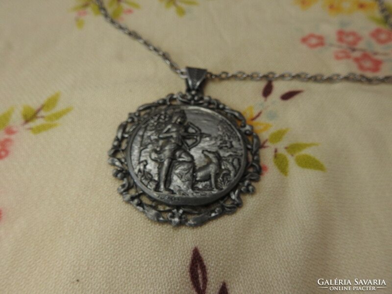 Antique large pendant triumph with a chain goddess of hunting