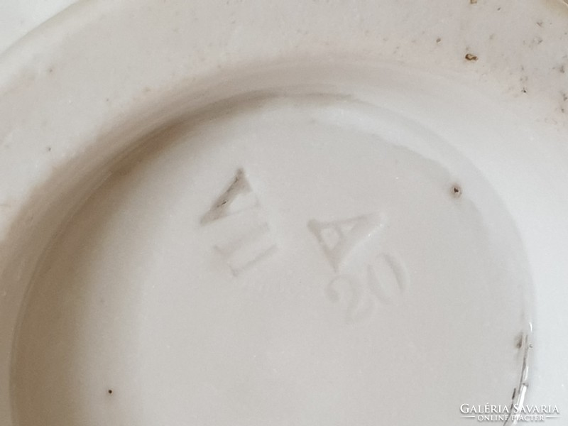 Old small jug with antique porcelain milk spout