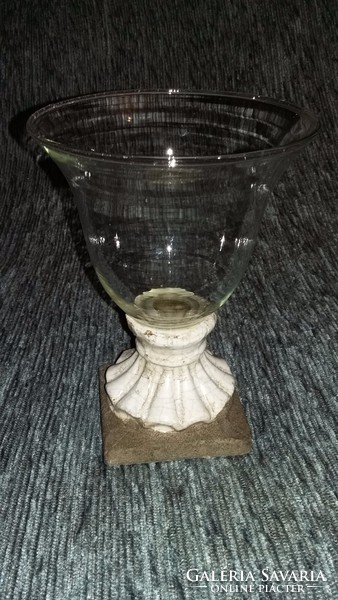 Glass candlestick with ceramic base