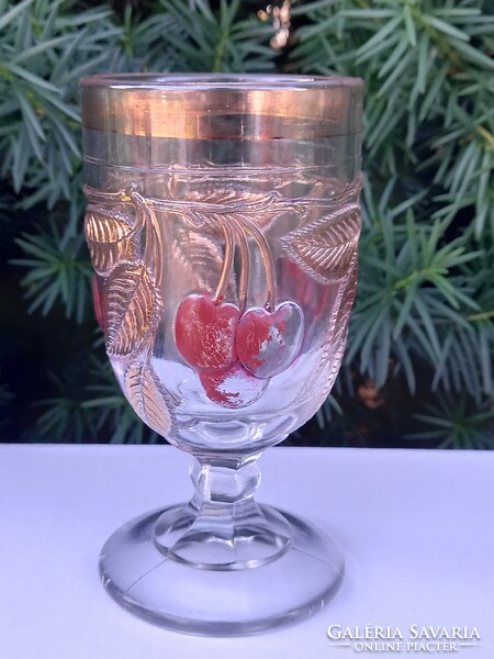 Antique gilded stemmed glass.