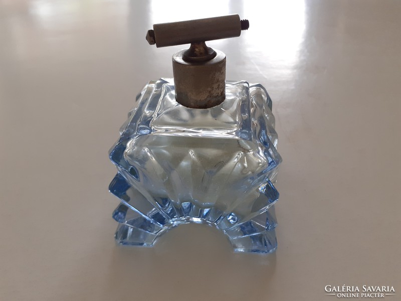 Old art deco perfume bottle circa 1930 with blue glass cologne