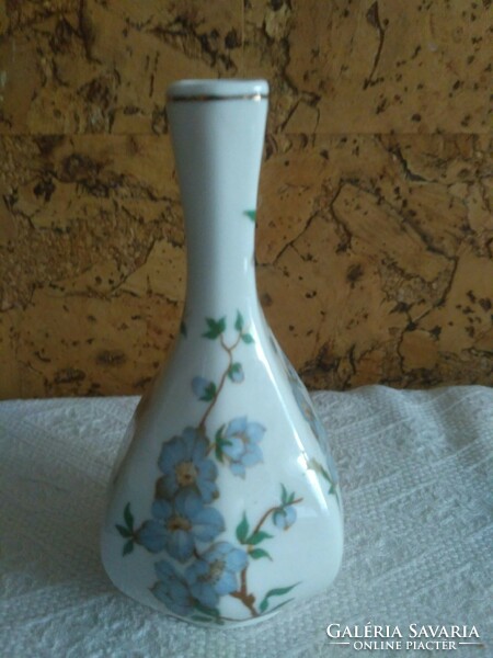 Raven house vase with peach blossoms