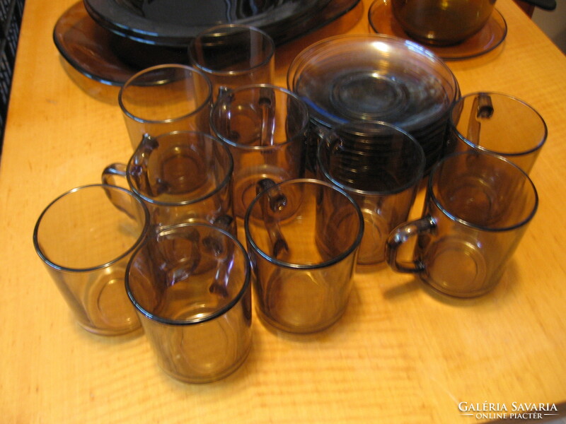 Smoke colored thick glass mugs with washers on face