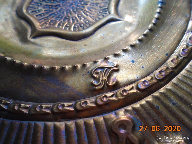 Signed modern artistic trembling, punched copper wall plate inspired by ancient patterns