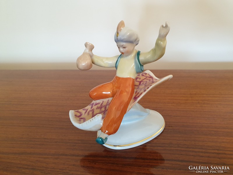 Old drasche porcelain oriental boy on carpet