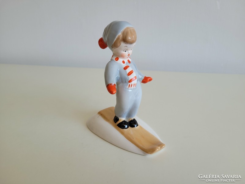 Old ceramic ski boy little boy
