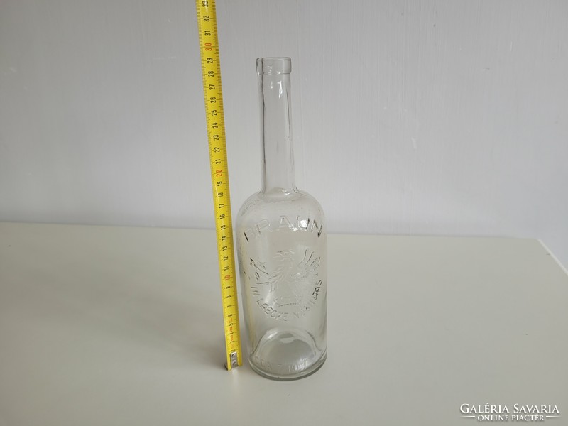 Old vintage Braun liquor glass bottle 0.7 l glass bottle with a concave bottom