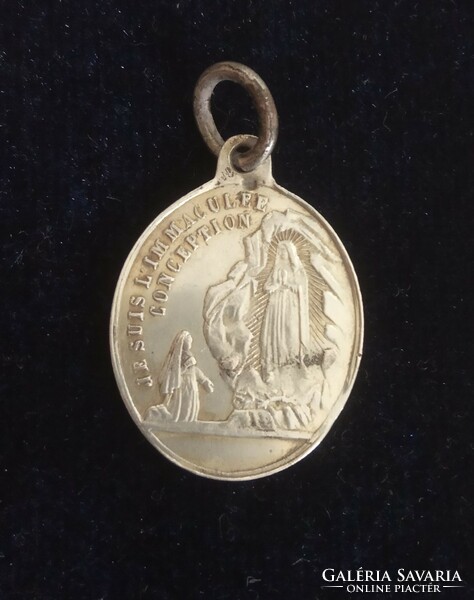 Antique silver religious Virgin Mary holy pendant grace medal from the Notre Dame Basilica of Our Lady of Lourdes