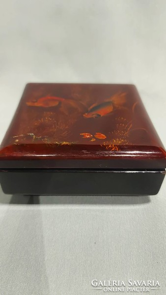 Oriental lacquer box with shining goldfish